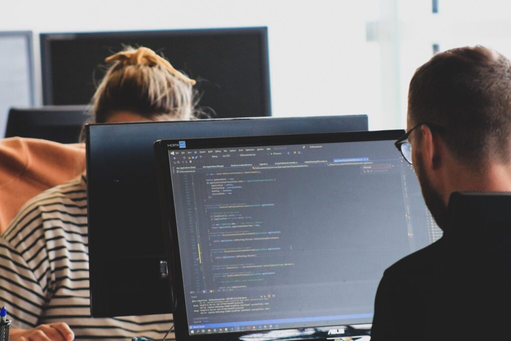 Man facing a computer screen.