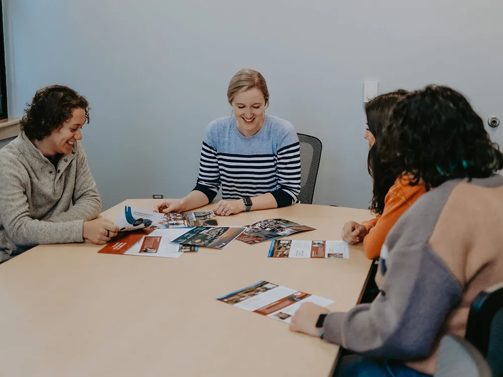 Director of Admissions, Abby Dooley, meets with students