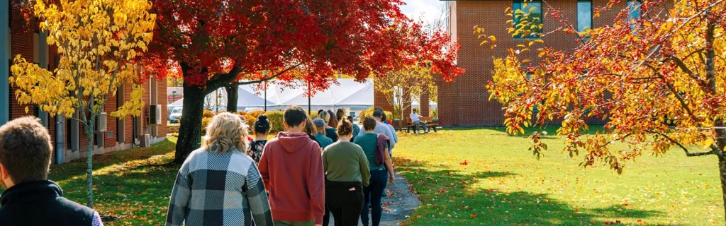 Visitors walking outside during Thomas College's Fall Open House