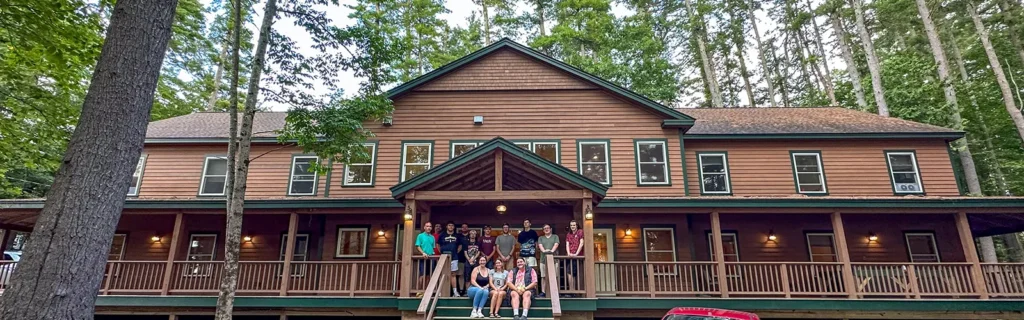 Thomas College enters multi-year agreement with Snow Pond Center for the Arts to lease a 28-room waterfront residence hall.