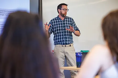 Professor Gleason teaches a class