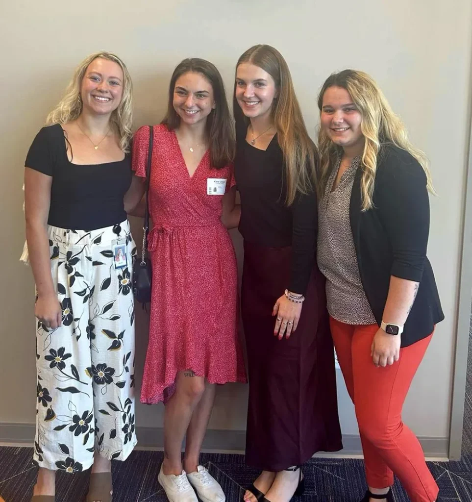Kiara Goggin with Thomas College students