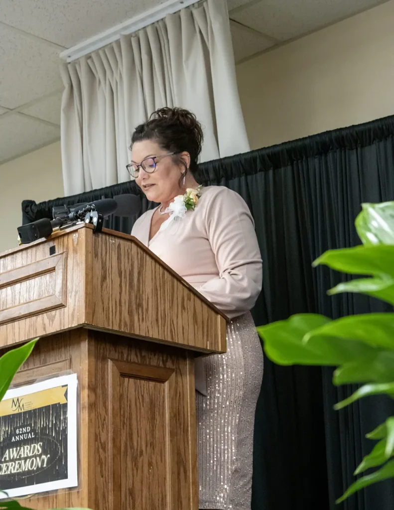 Michelle Joler-Labbe at Podium at Mid-Maine Chamber of Commerce