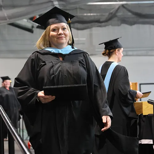 thomas college student jenni greenlaw graduates with her master's in education degree