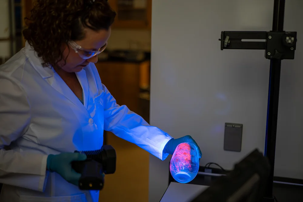 thomas college science professor alicia mccarthy working in the science labs