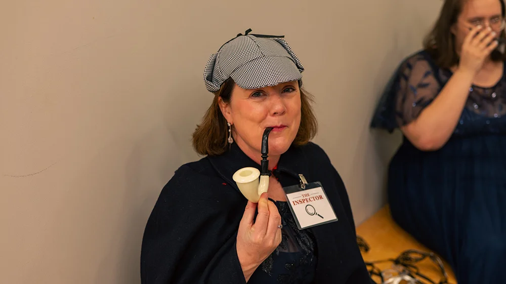 thomas college professor alicia mccarthy dressed as inspector during inauguration event
