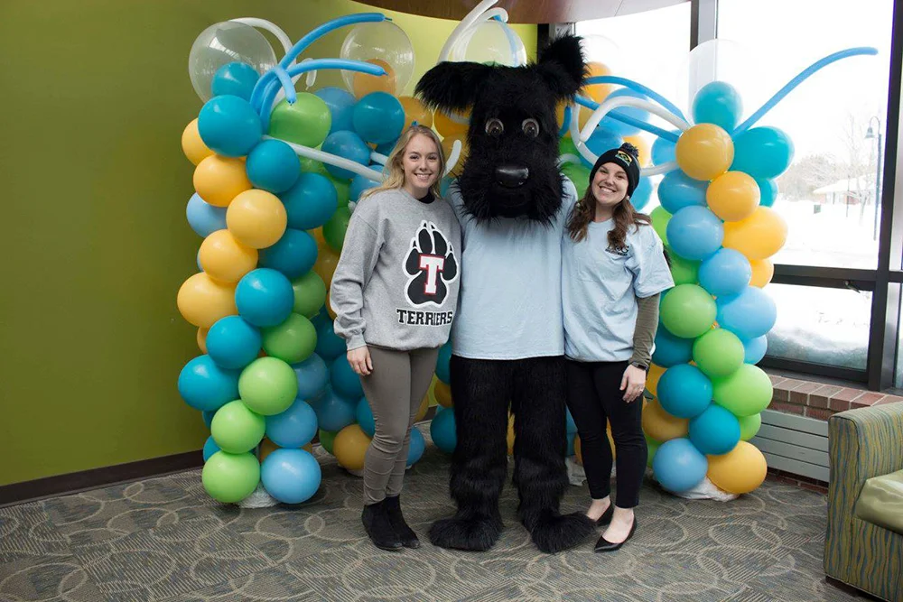 Amanda Wrigley with Student and Tommy the Terrier