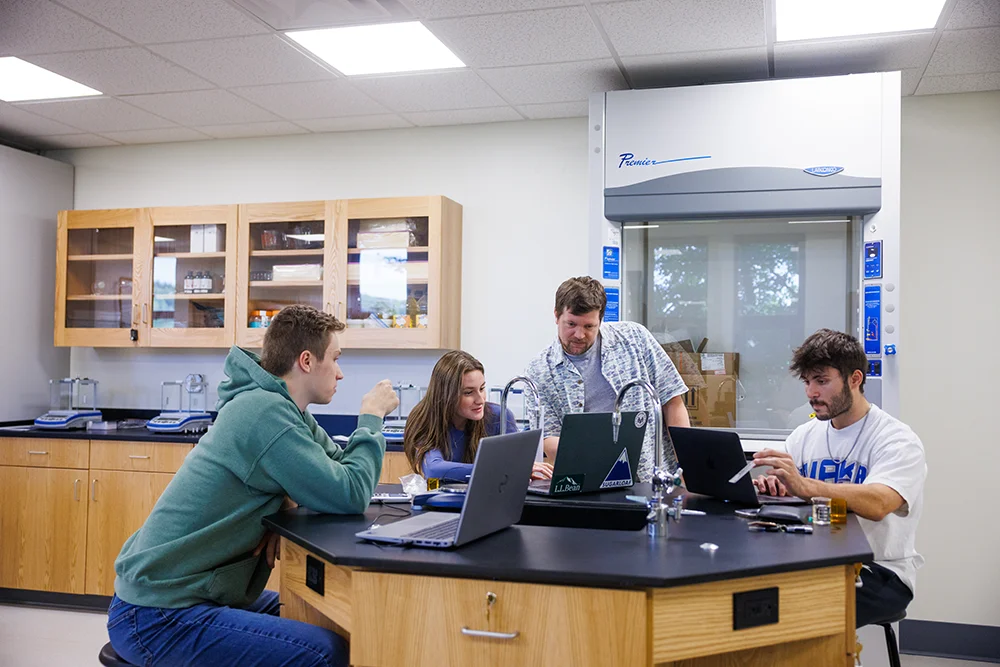 Professor Josh Havelin with Science Students in the Chemistry Lab
