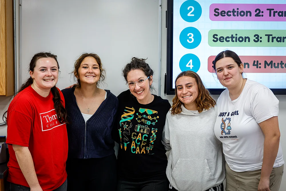 Thomas College students and faculty pose for a photo during Girls in Science Day 2026 at Thomas College