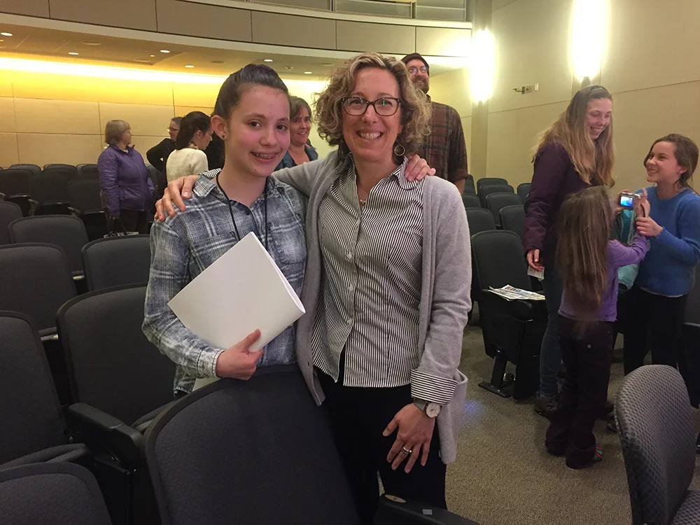 Jeannine with spelling bee participant