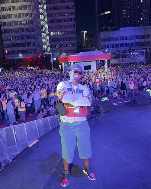 Bismark Akoto in front of World Cup fans at the Boston Fan Festival