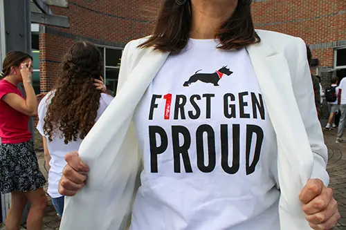 A view of someone's shirt that reads First Gen Proud