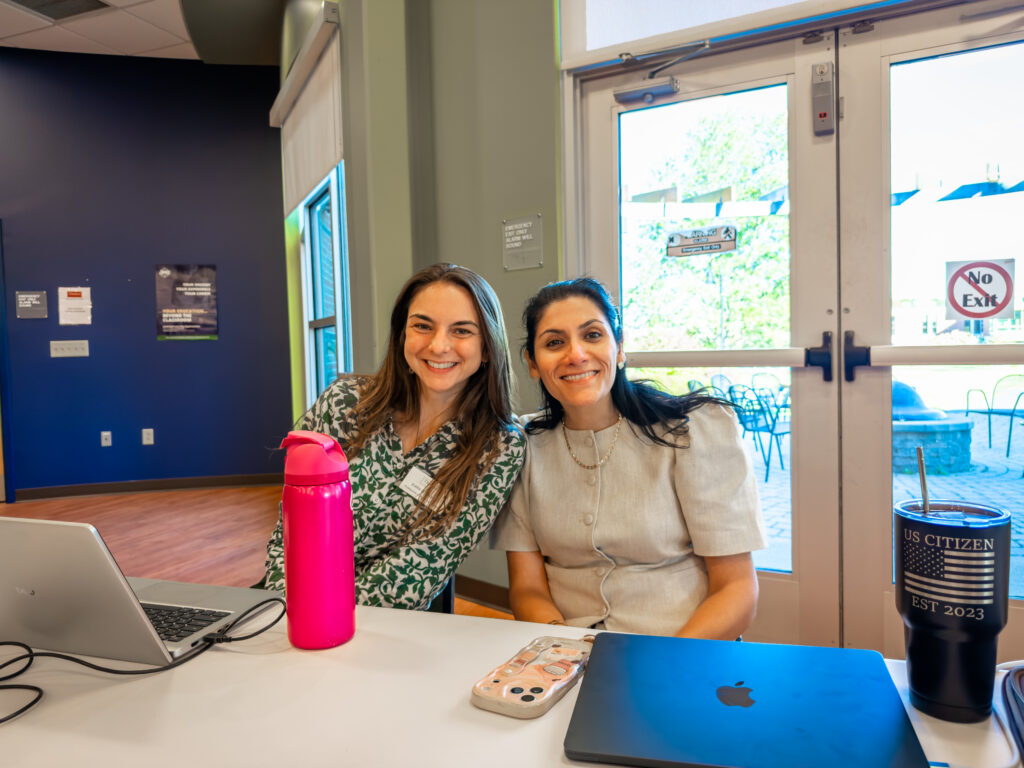 Professional and Career Development staff Kiara Goggin and Suheir Alaskari at the accounting firm night event at Thomas College.
