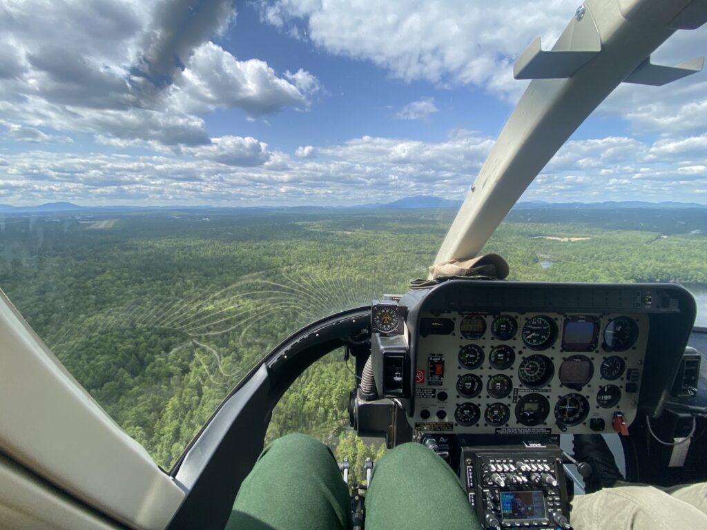 A view from a helicopter over a field